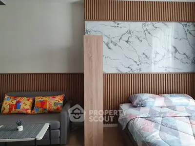 Modern studio apartment with stylish wood paneling and marble accent wall