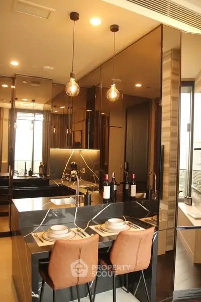 Luxurious modern kitchen with sleek design and elegant lighting