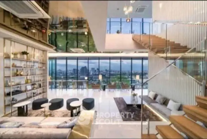 Luxurious modern living room with stunning city view and elegant staircase