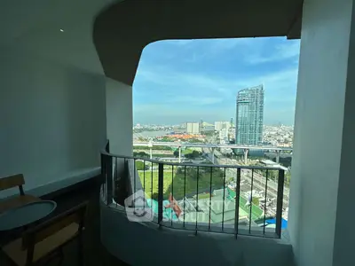 Stunning cityscape view from a modern balcony with sleek railing design.