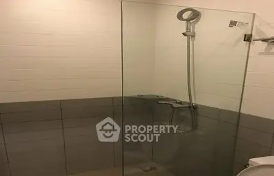 Modern bathroom with sleek shower design and contemporary tiles