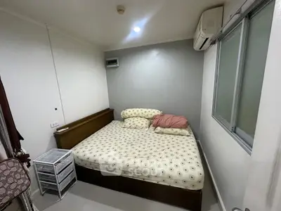 Cozy bedroom with air conditioning and modern decor