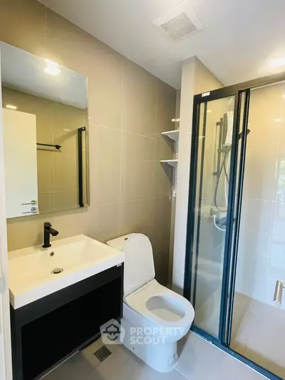 Modern bathroom with sleek shower and contemporary fixtures