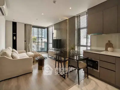 Modern living room with open kitchen, large windows, and stylish decor in a high-rise apartment.