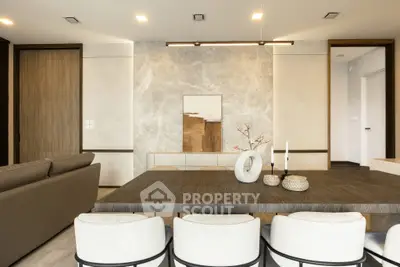 Elegant modern living room with stylish dining area and contemporary decor