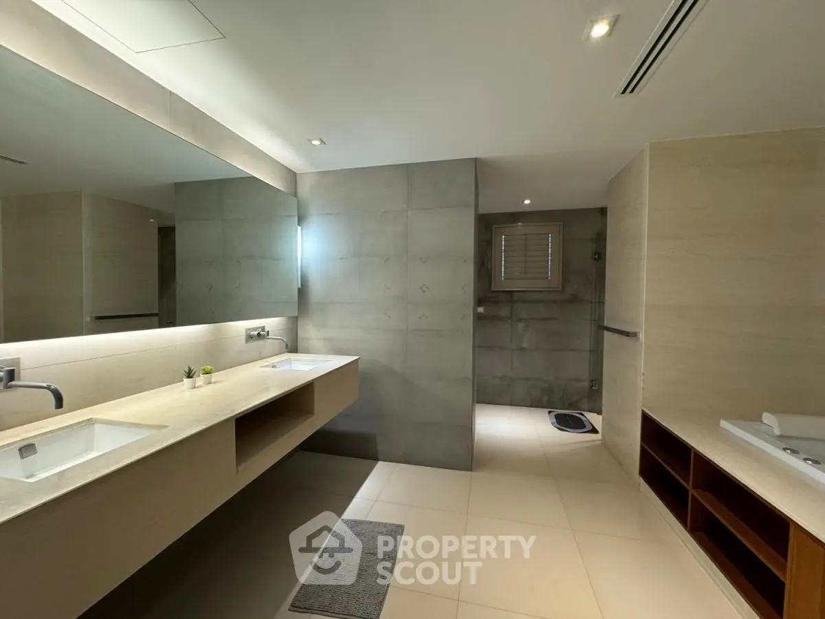 Spacious modern bathroom with dual sinks and sleek design