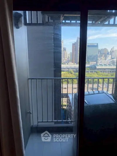 Urban balcony with city skyline view, perfect for enjoying the vibrant cityscape from your home.