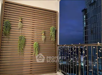 Charming balcony with hanging plants and city view, perfect for relaxation and enjoying urban living.