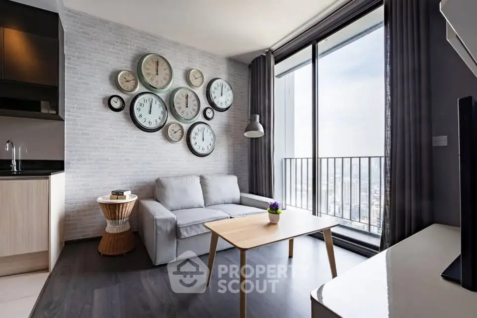 Modern living room with city view, stylish decor, and large windows for natural light.