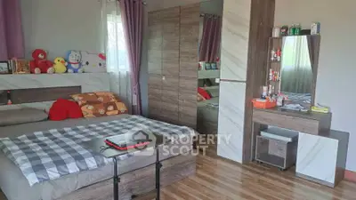 Cozy bedroom with modern wooden furniture and natural light