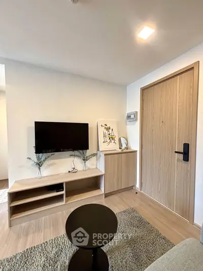 Modern living room with sleek TV setup and stylish decor