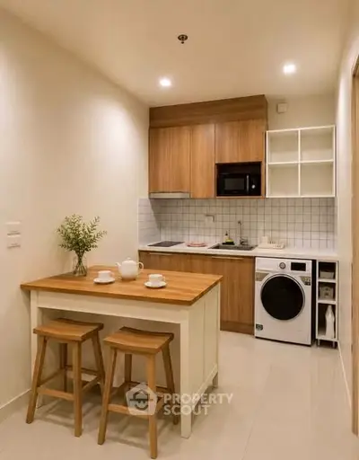 Modern compact kitchen with wooden cabinets and integrated washing machine