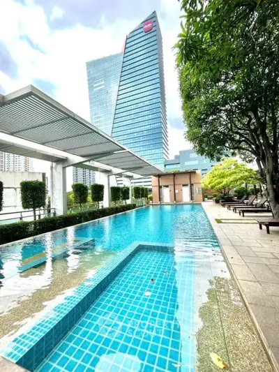 Luxurious rooftop pool with stunning cityscape views and modern amenities.