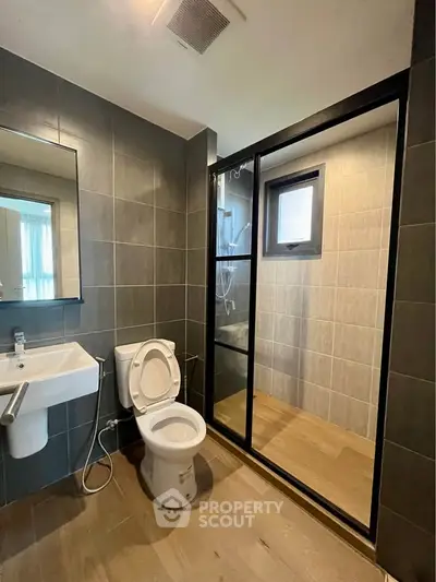 Modern bathroom with sleek shower and contemporary fixtures