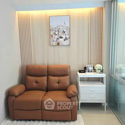 Cozy living room with leather sofa and modern decor