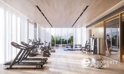 State-of-the-art gym with modern equipment and floor-to-ceiling windows offering ample natural light, perfect for a high-end fitness experience.