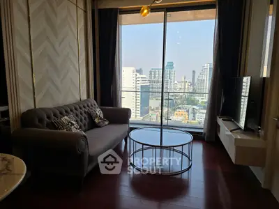 Luxurious living room with stunning city view, elegant sofa, and modern decor.