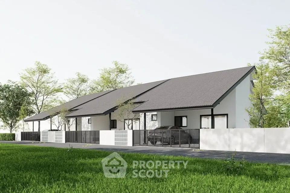 Modern row of minimalist houses with sleek design and lush green surroundings.