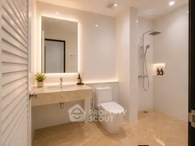 Modern bathroom with elegant fixtures and spacious shower area