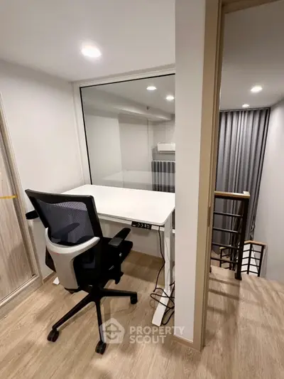 Modern study area with ergonomic chair and desk in stylish apartment