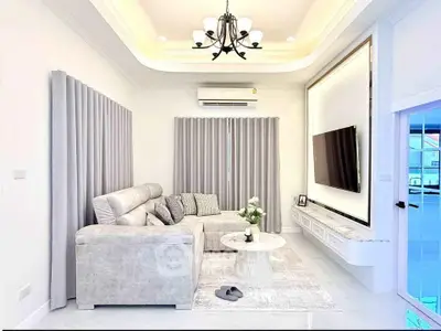Luxurious modern living room with elegant decor and cozy seating area