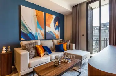 Stylish living room with modern decor and balcony view