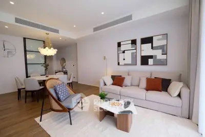 Stylish modern living room with elegant decor and cozy seating area.