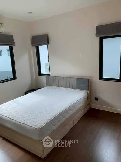 Modern bedroom with minimalist design and natural light