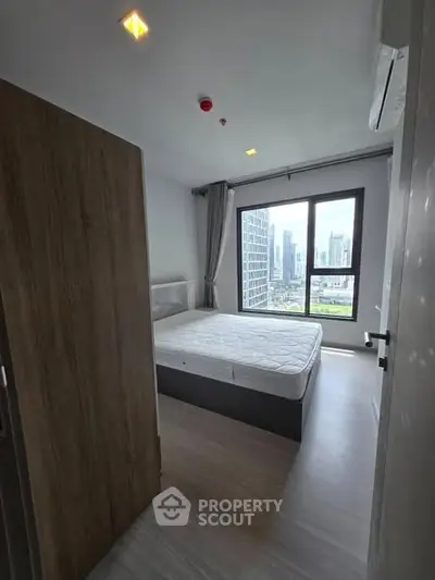 Modern bedroom with city view and minimalist design