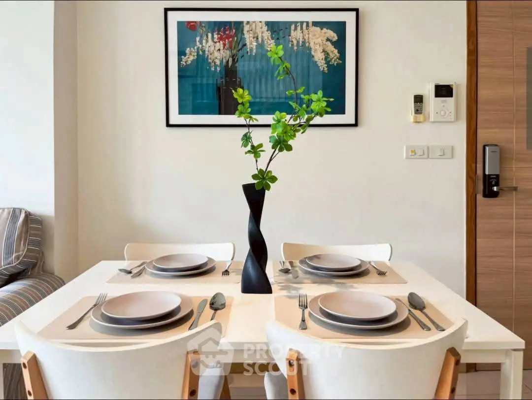 Modern dining area with elegant table setting and stylish decor