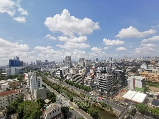 Stunning cityscape view showcasing urban skyline and vibrant architecture under a clear blue sky.