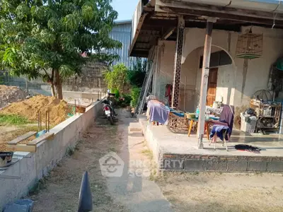 Charming rustic property with spacious outdoor area and potential for renovation.