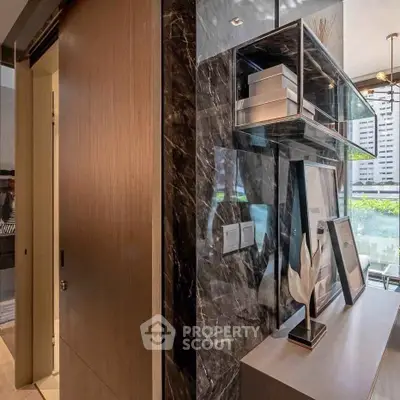 Luxurious modern interior with sleek marble accents and stylish decor in a high-rise apartment.