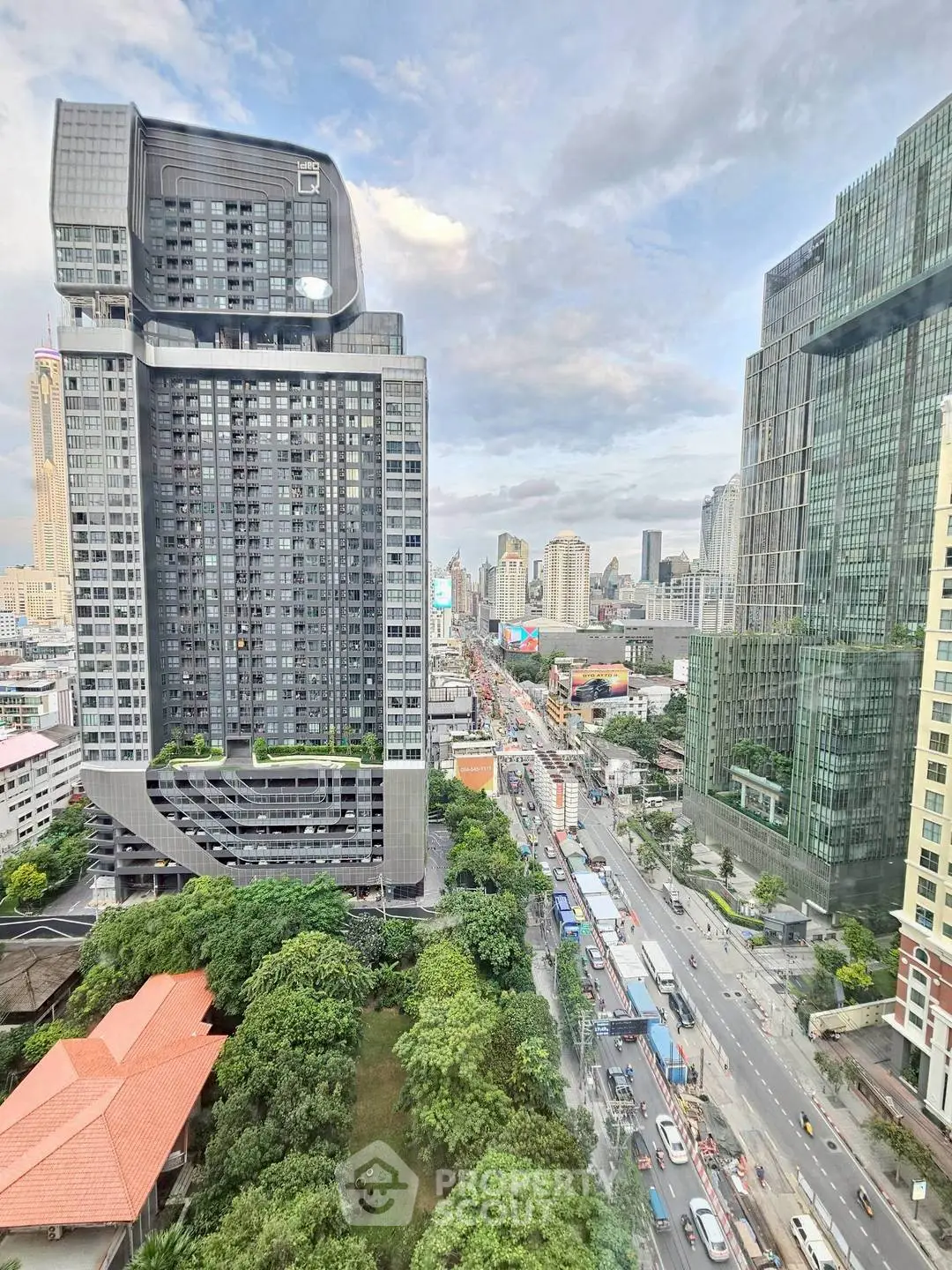 Stunning cityscape view showcasing modern high-rise buildings and bustling urban streets.