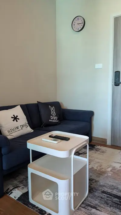 Cozy living room with modern decor and stylish furniture, perfect for relaxation and entertainment.
