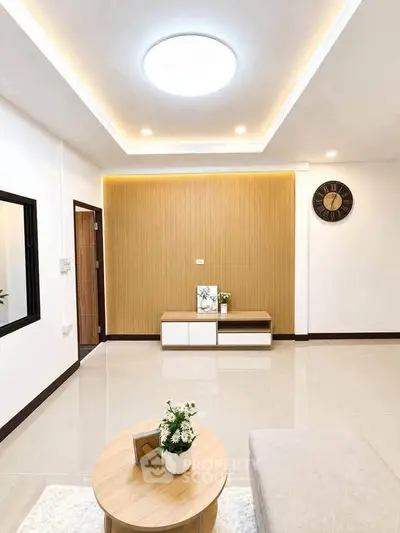 Modern living room with elegant lighting and stylish decor