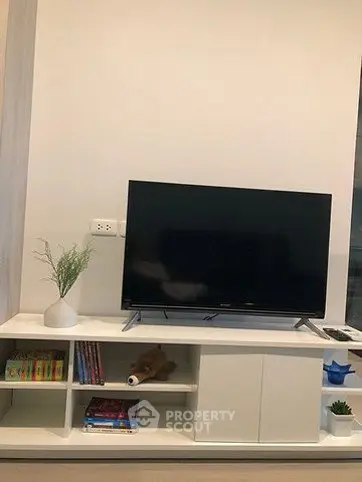Modern living room with sleek TV stand and stylish decor