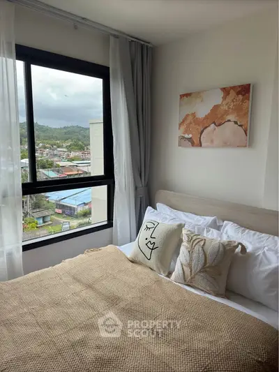 Cozy bedroom with scenic view and stylish decor