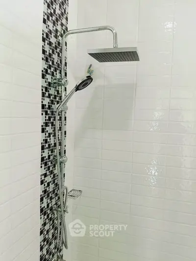 Modern bathroom shower with sleek design and stylish tile accents