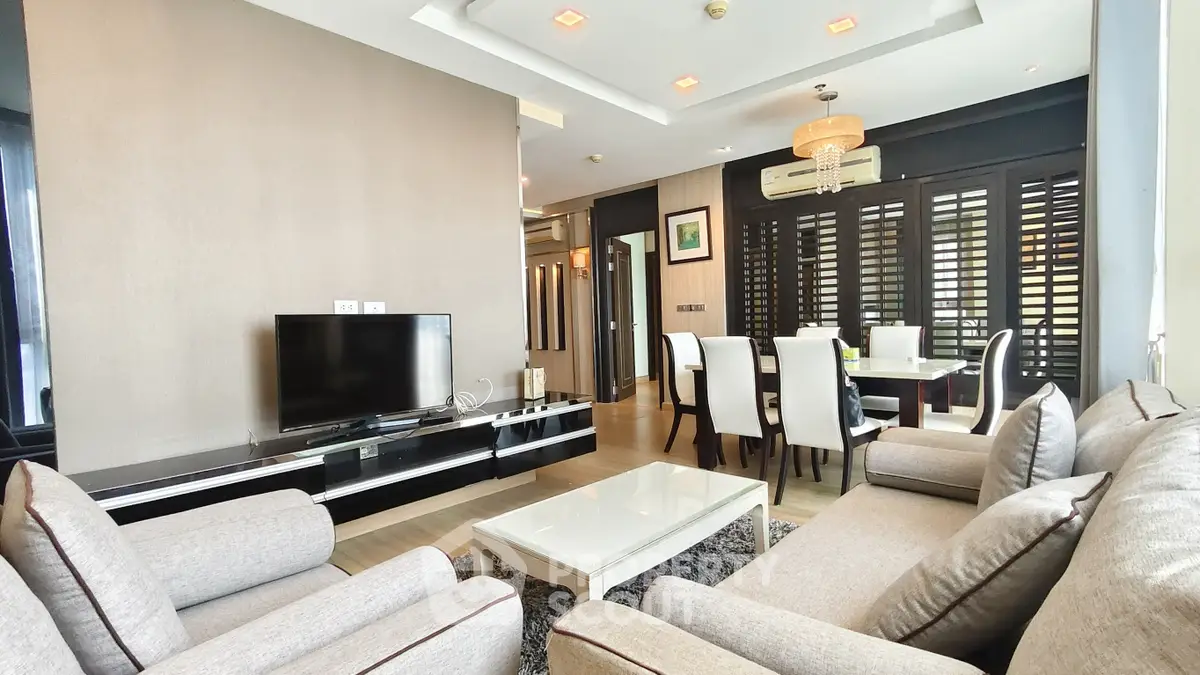 Luxurious living room with elegant dining area and modern decor