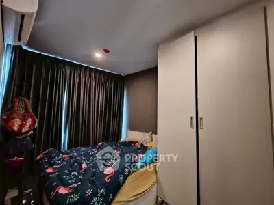 Cozy bedroom with modern wardrobe and stylish decor