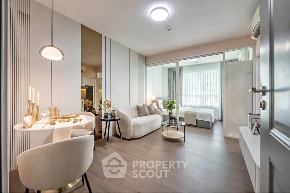 Modern open-plan living room with elegant decor and cozy ambiance