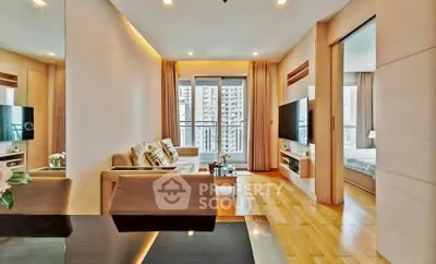 Modern living room with elegant decor and city view, featuring open layout and natural light.
