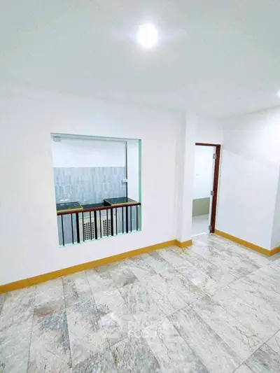 Spacious interior with tiled flooring and open layout