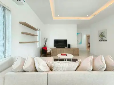 Spacious modern living room with elegant decor and natural light