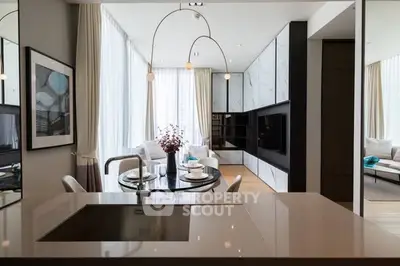 Luxurious modern living room with open kitchen and elegant decor