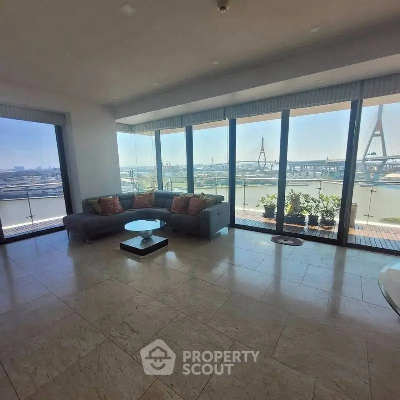 Stunning living room with panoramic city view and modern decor