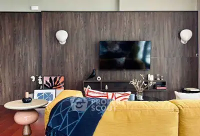 Stylish living room with modern decor and wall-mounted TV