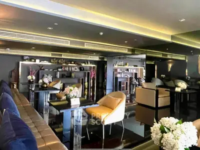 Luxurious modern living room with elegant seating and ambient lighting