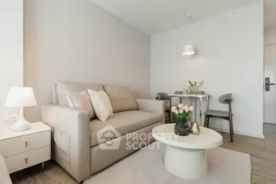 Modern living room with elegant decor and cozy seating area